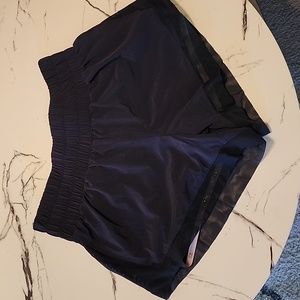 IVL black running shorts